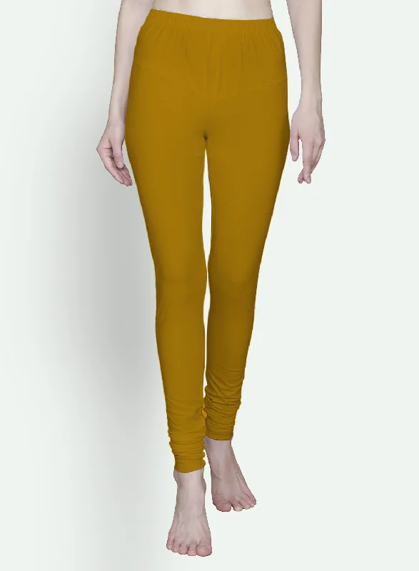 T.T. Women Solid Chudidar Cotton Lycra Cool Leggings -Saffron Elegant Satin Finish Leggings T.T. Women Solid Chudidar Cotton Lycra Cool Leggings -Saffron Elegant Satin Finish Leggings